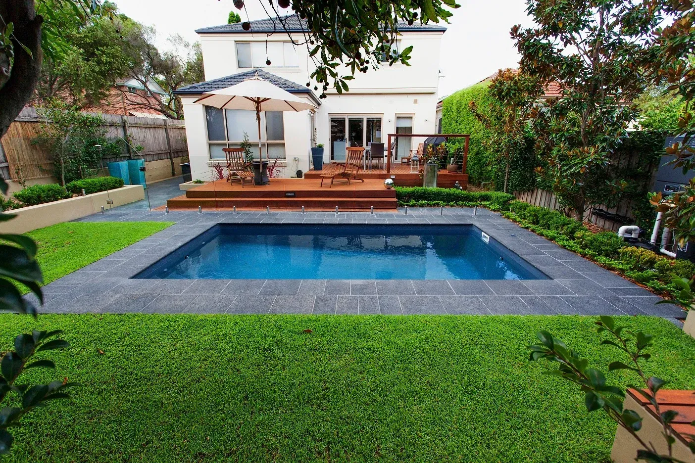A swimming pool in the backyard of a Tennessee house