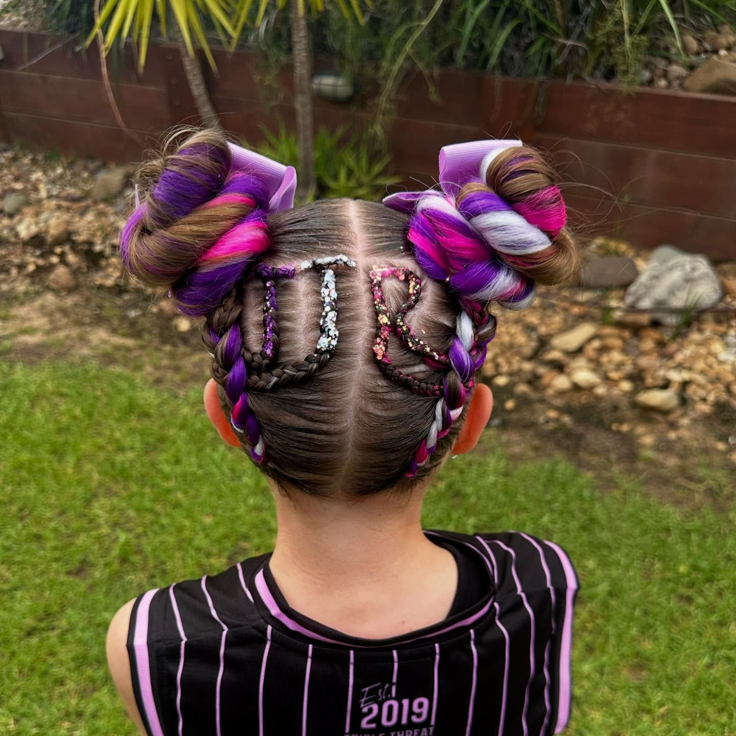 Back View of a Child With Colourful Purple and Pink Braided Hair — Sweet Parties & Braids in Tatton, NSW