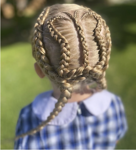 Hairdresser Braiding the Hair of a Young Girl — Sweet Parties & Braids in Tatton, NSW