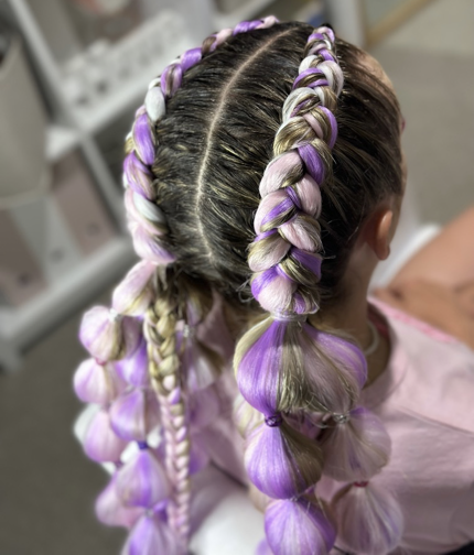 Braided Hairstyle With Purple-and-white Ribbon Threads on Dark Hair — Sweet Parties & Braids in Tatton, NSW