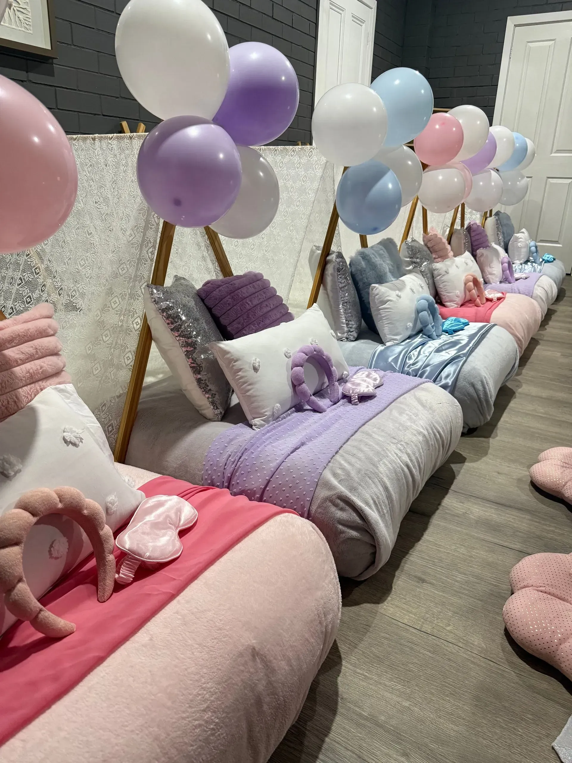 Pastel Balloon-decorated Lounge Chairs With Pillows — Sweet Parties & Braids in Tatton, NSW