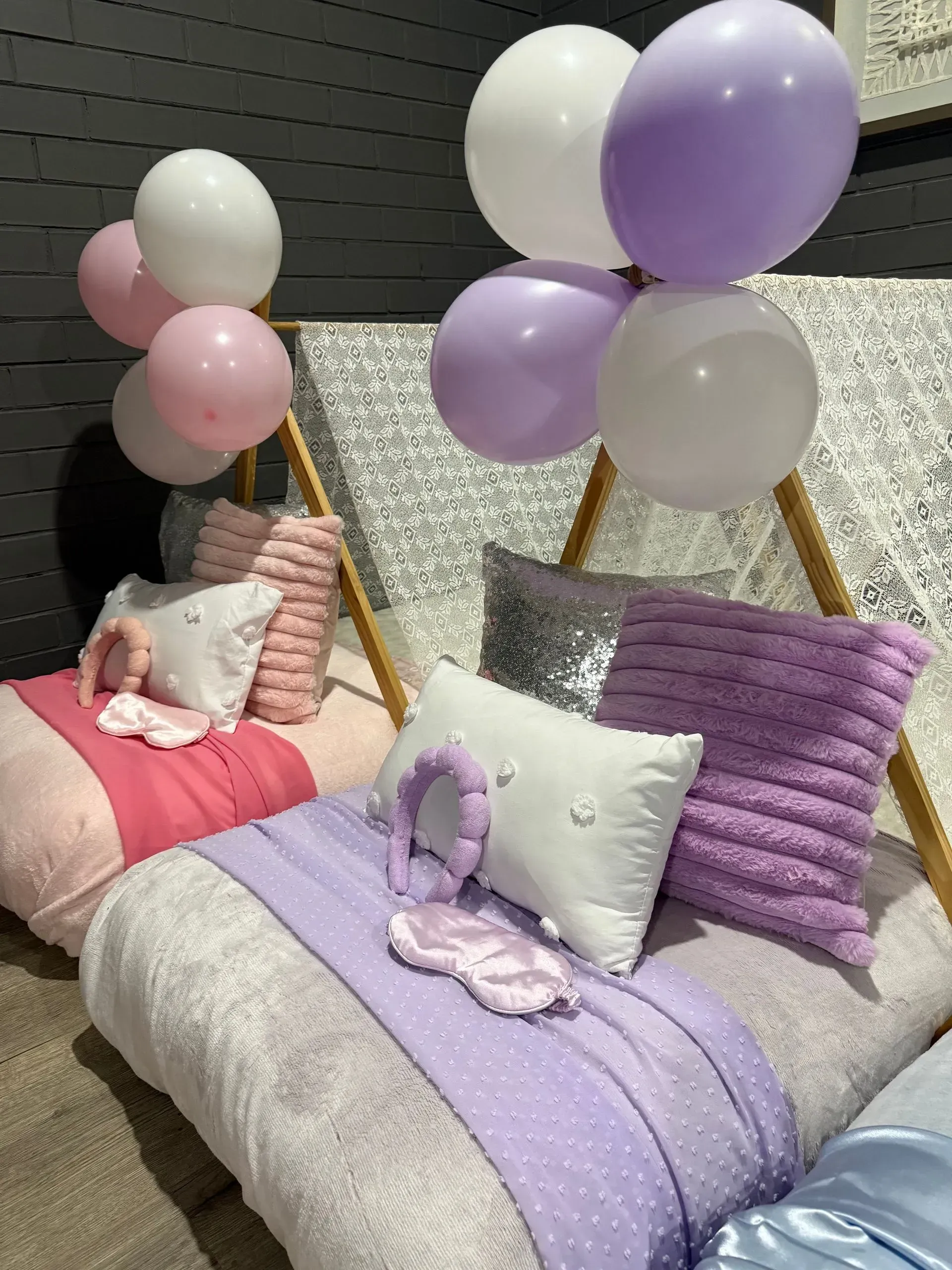 Pastel Balloon-decorated Twin Beds With Pillows and Blankets — Sweet Parties & Braids in Tatton, NSW