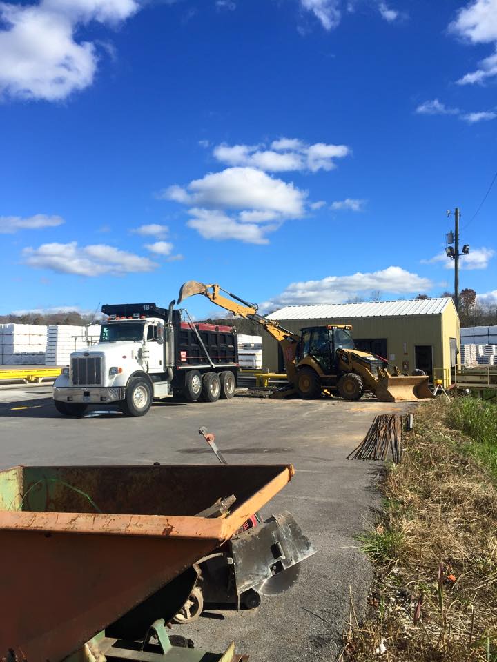 Backhoe Loader and a Truck — Mantorville, MN — Brooks Excavating & Construction, LLC