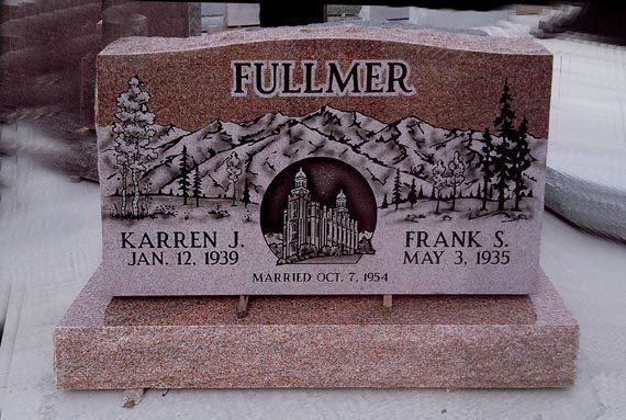 Pink granite gravestone with “FULLMER” and snowy trees, marking Karen and Frank S. Fuller.