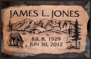 Memorial plaque for James L. Jones with mountain scene, elk, and dates Jul 8, 1929–Jun 30, 2012