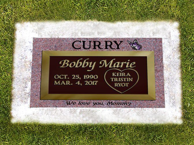 Gravestone for Bobby Marie Curry with dates and “We love you, Mommy” inscription.