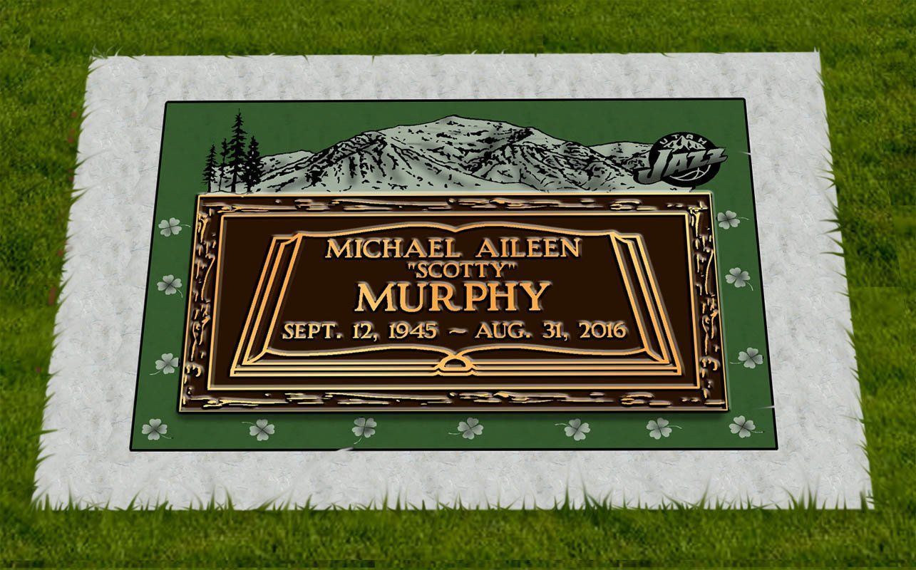 Engraved memorial plaque for Michael Allen Murphy set in a grassy cemetery plot.