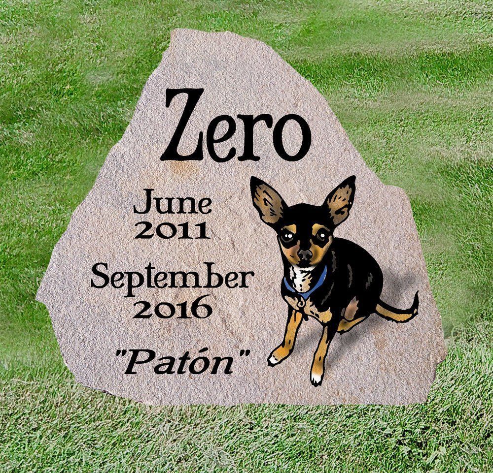 Memorial stone in grass for “Zero,” June 2011–September 2016, with a small dog illustration.