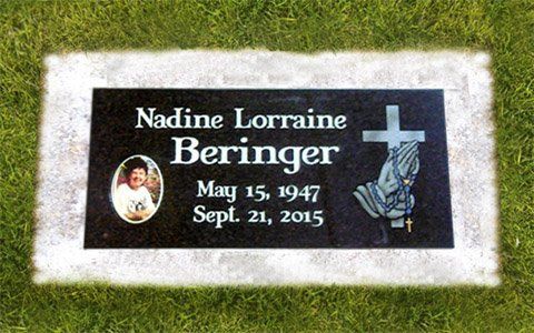 Gravestone plaque for Nadine Lorraine Beringer with dates, photo medallion, and blue cross emblem.