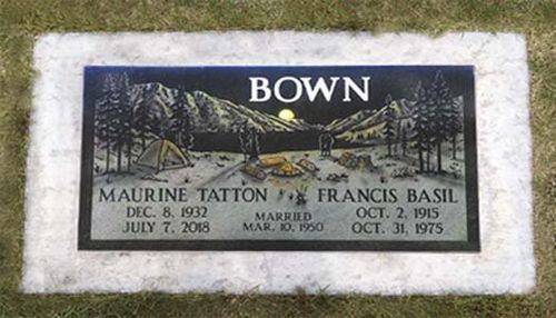 Bown family gravestone plaque with engraved names and dates in a stone border