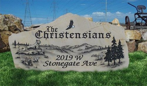 Stone sign reading “The Christians” and “2019 W Stonegate Ave” beside grass and trees