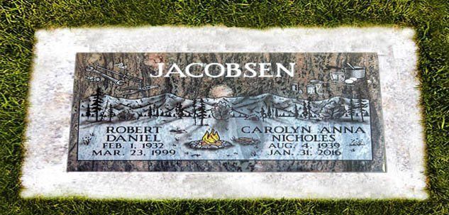Jacobsen family gravestone plaque in a grassy cemetery, with black-and-white photo and engraved names.