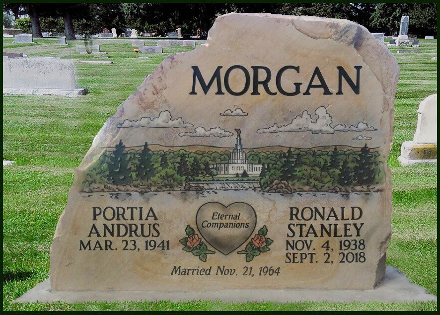 Morgan family gravestone with engraved names Portia Andrus and Ronald Stanley in a cemetery.