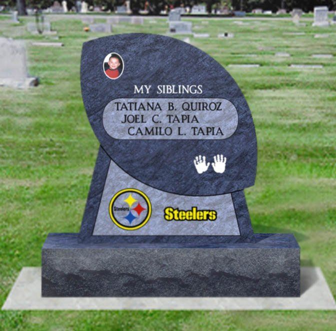 Gravestone with engraved names, Steelers logo, and small handprints in a cemetery setting