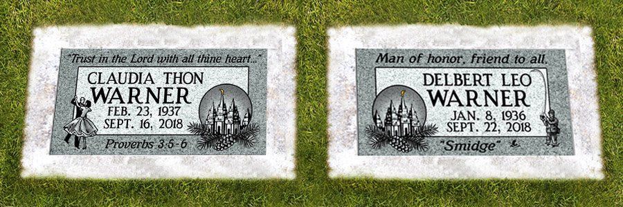 Two white gravestones in grass, one for Claudia Warner and one for Derek Leo Warner.