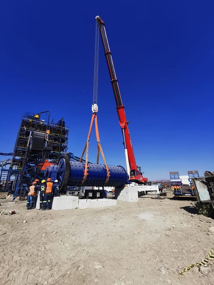 A Large Crane Is Lifting A Large Object In The Air — All Lift Cranes In Ulladulla, NSW