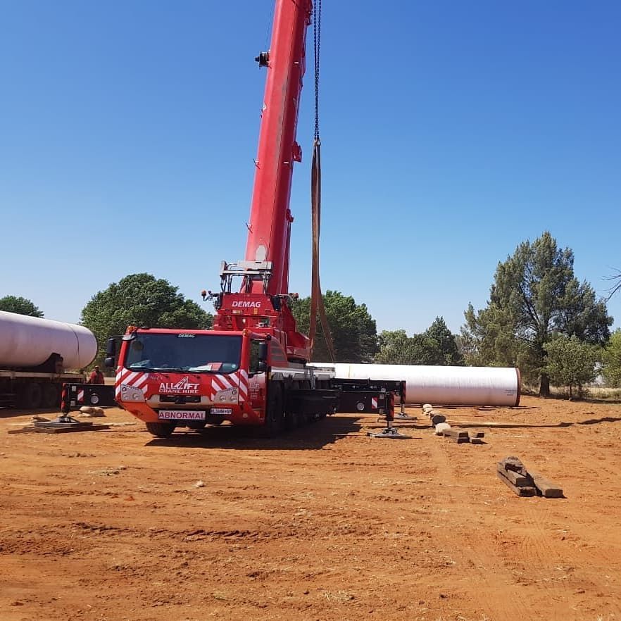 A Red Truck With A Crane Attached To It — All Lift Cranes In Berry, NSW