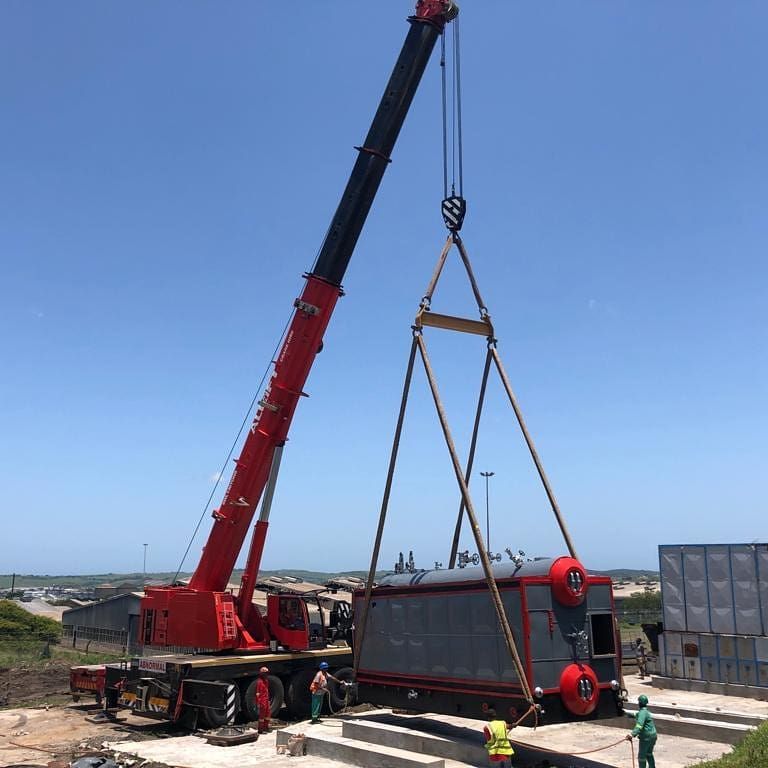 A Large Red Crane Is Lifting A Large Object — All Lift Cranes In St Georges Basin, NSW