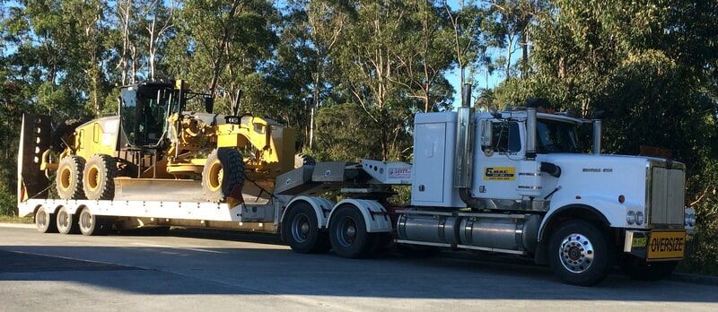 Tri Low Loader with Excavator — Elmac Plant Hire In Taree