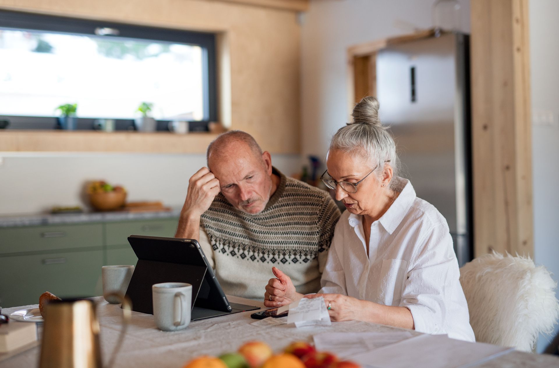Senior couple sitting at the kitchen table - Stayton, OR - Stayton Law