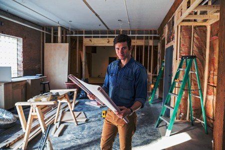 Surveyor checking for defects
