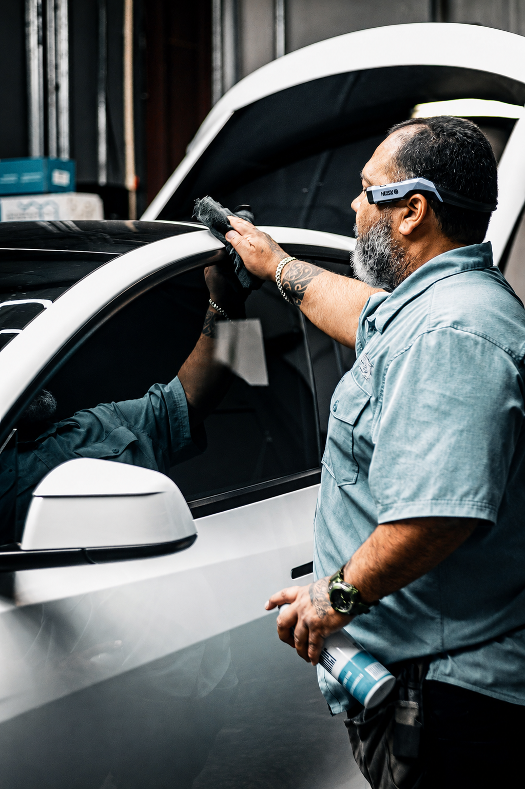 inspecting vehicle finish during a branding session - Shine Again Photography Newnan GA