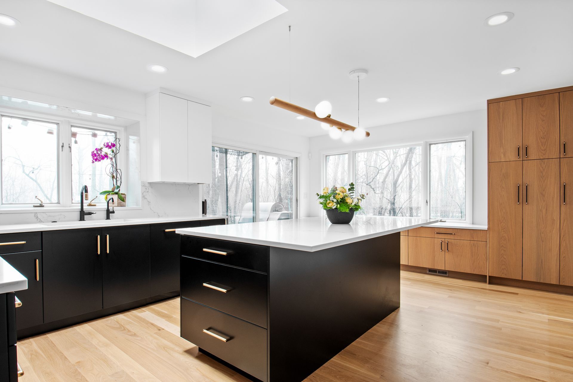 There is a large island in the middle of the kitchen.