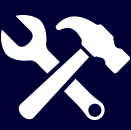 A wrench and hammer crossed over each other on a blue background.