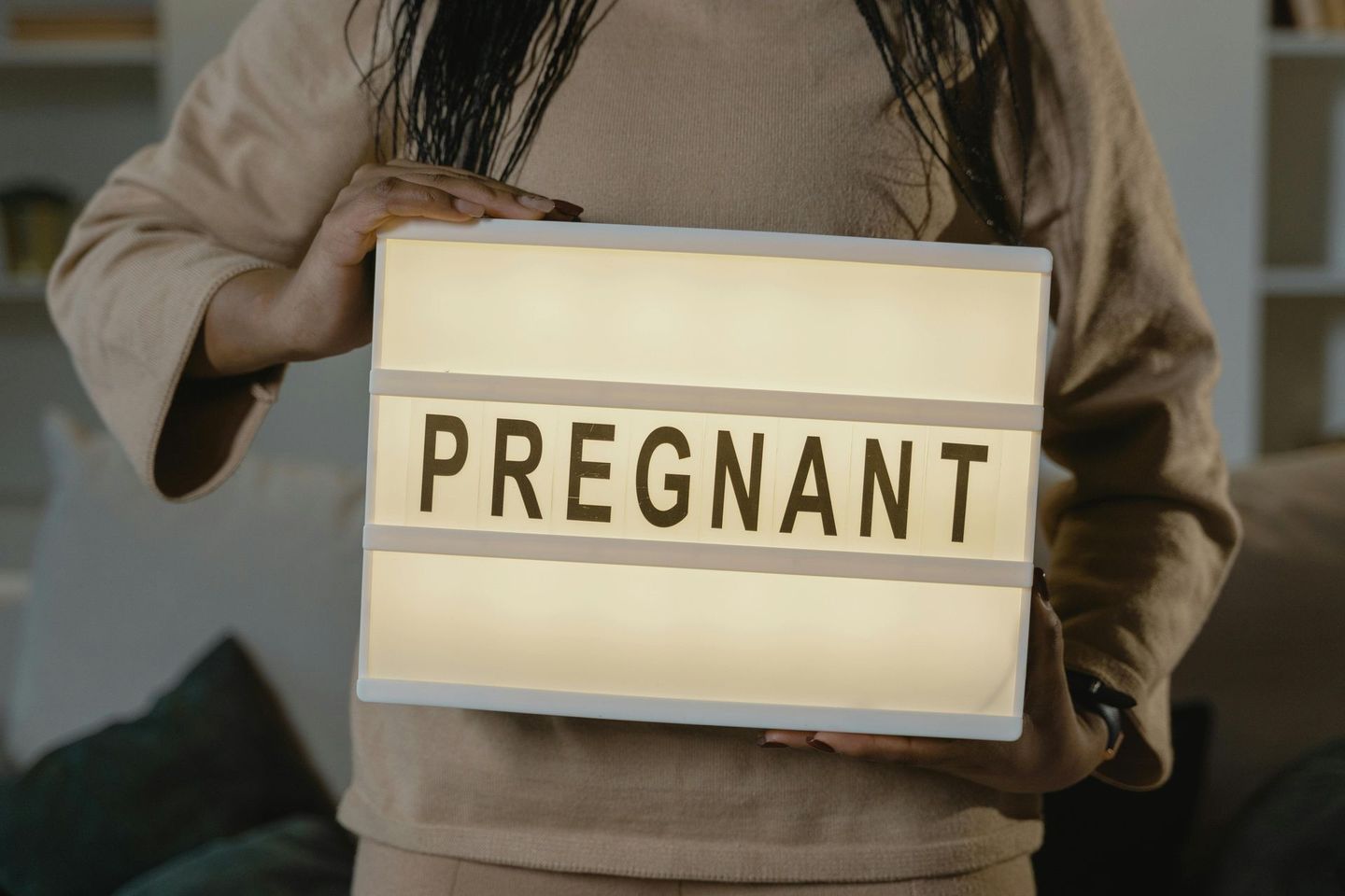 Pregnancy announcement moment. supporting expecting mothers in Abilene TX with compassionate doula care