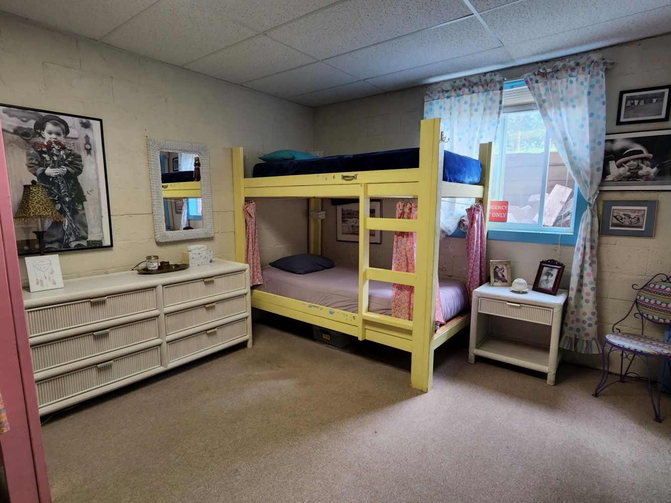 There is a bunk bed in the middle of the room.
