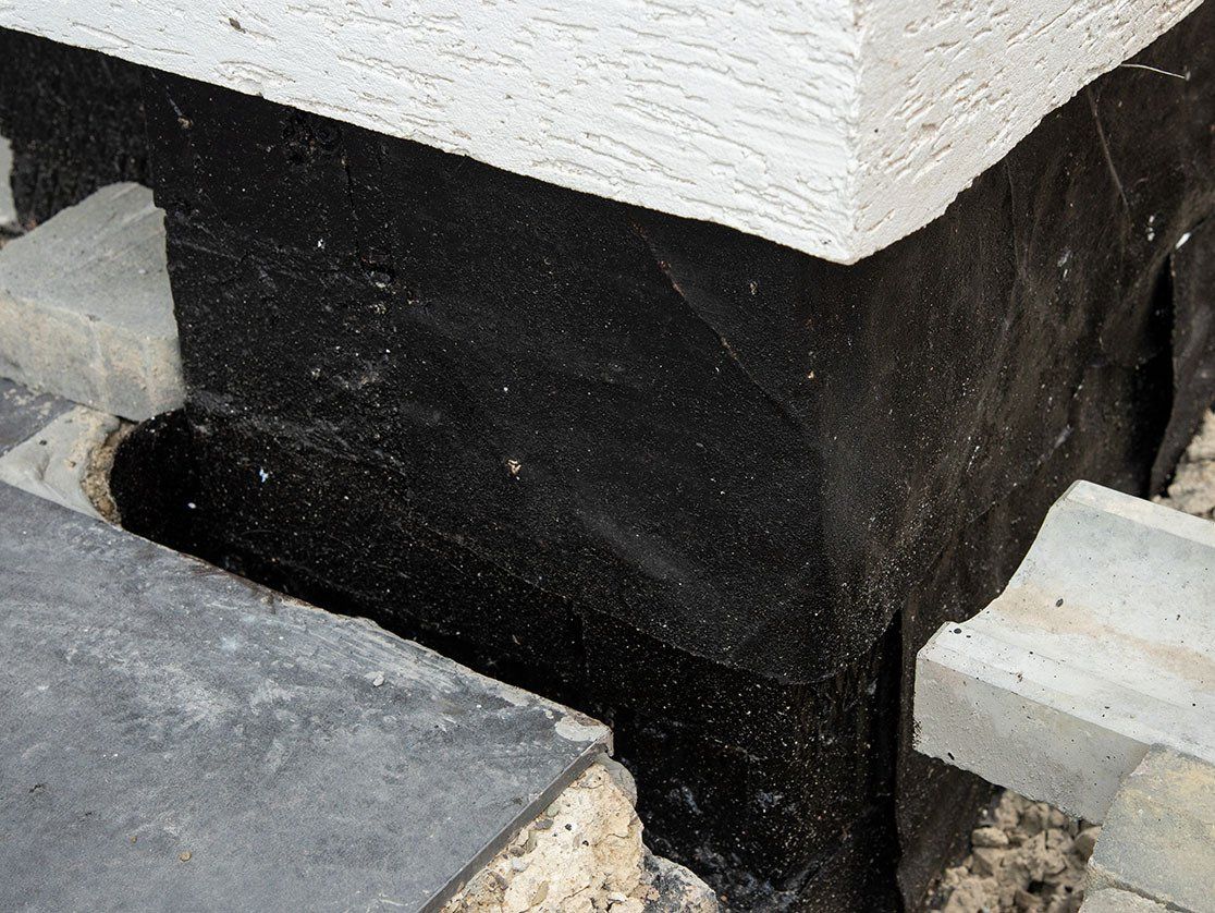 image of an Akron, OH basement with waterproofing applied