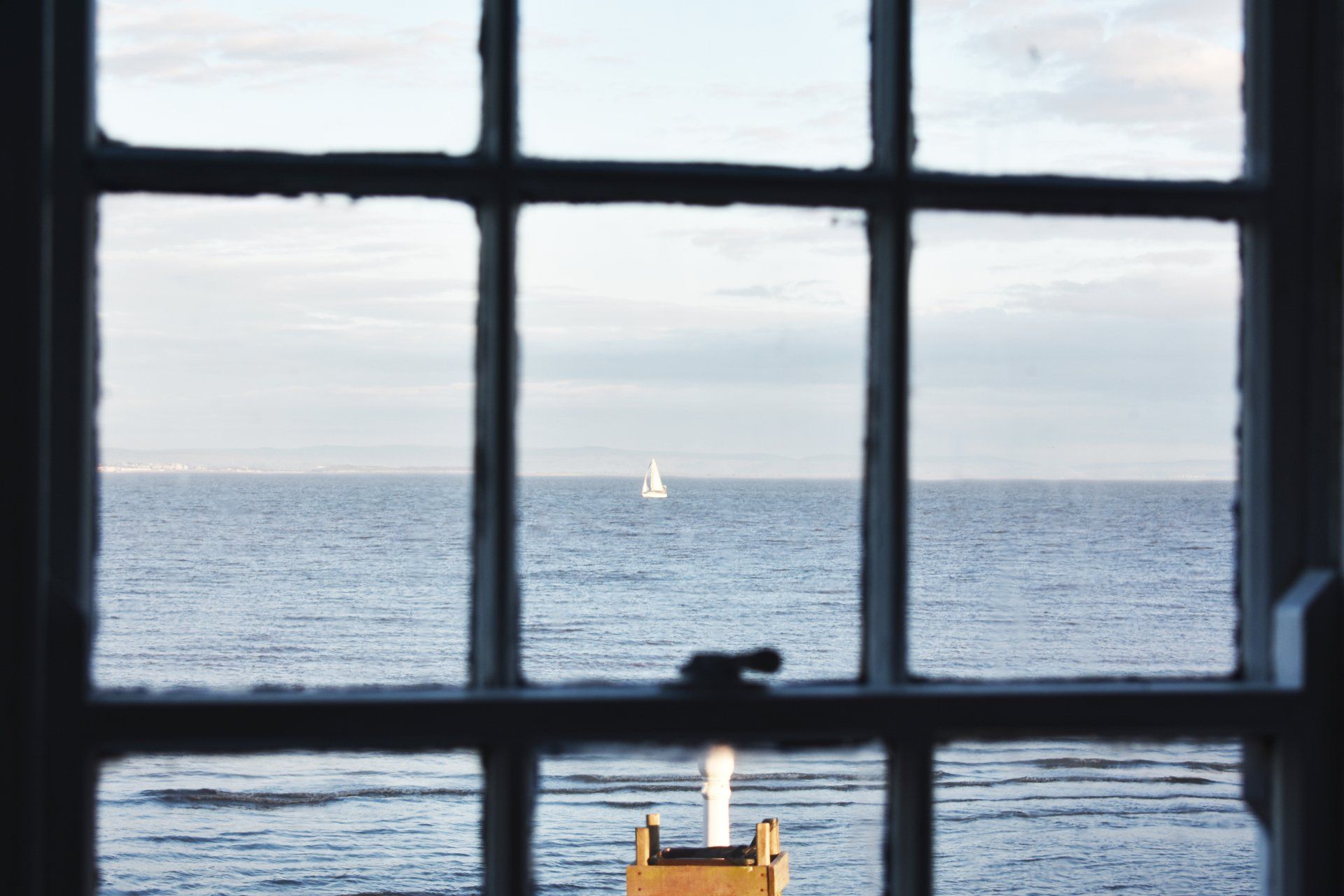 The sailing yachts that come out on a sunny day with the tide in outside the lodge at the West Usk Lighthouse.