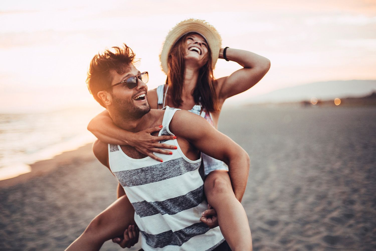 Happy Couple on Beach — Dallas, TX — Wings of the Future