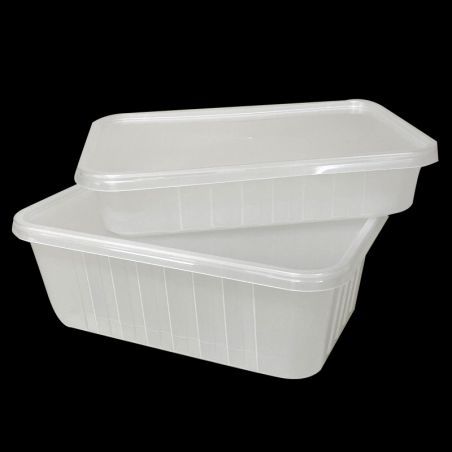 Two white lidded takeout containers stacked on a black background