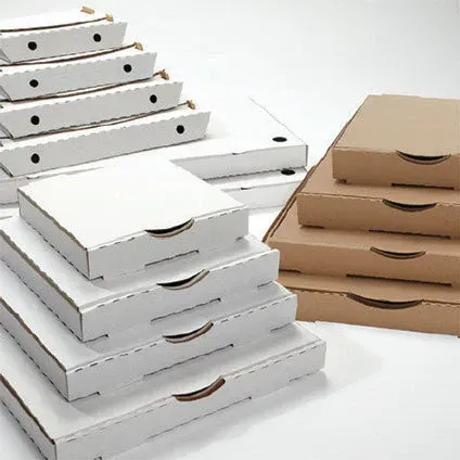 Stacks of white and brown pizza boxes on a plain white background