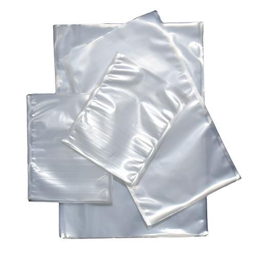 Stack of clear plastic zip-top bags with white sealing strips