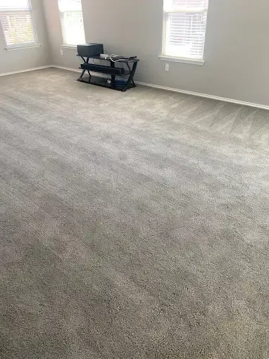 MB Carpet Cleaning- A There is a desk in the middle of the room.