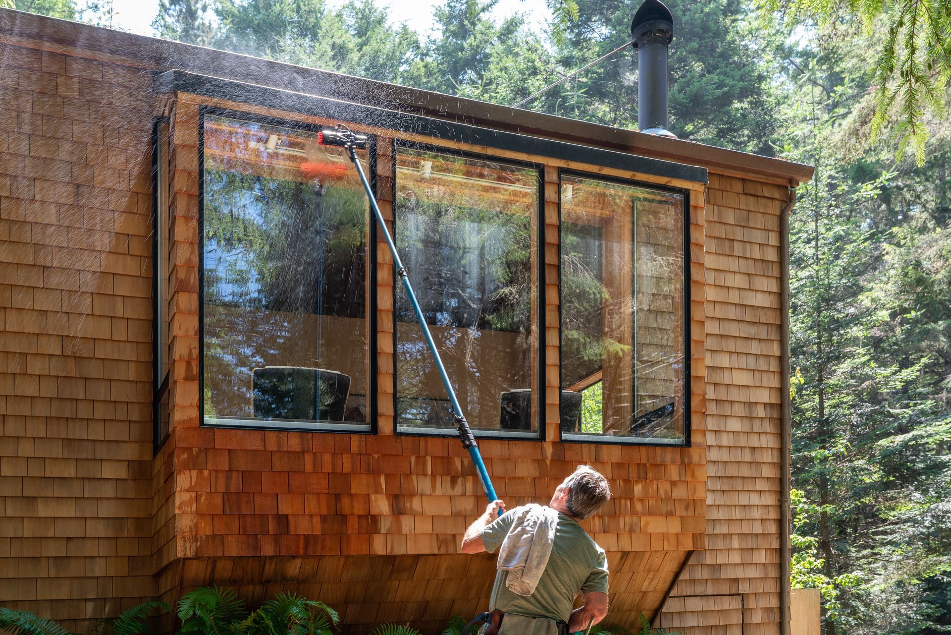 Man Washing Window — Jesup, GA — O'Neal Premier Services