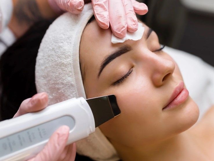 The Skinutrition Clinic providing a clinical facial treatment in Coventry