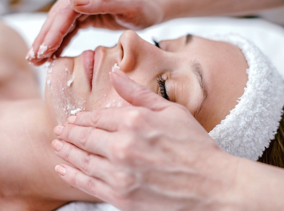 The Skinutrition Clinic performing a facial scrub as part of spa treatment in Coventry