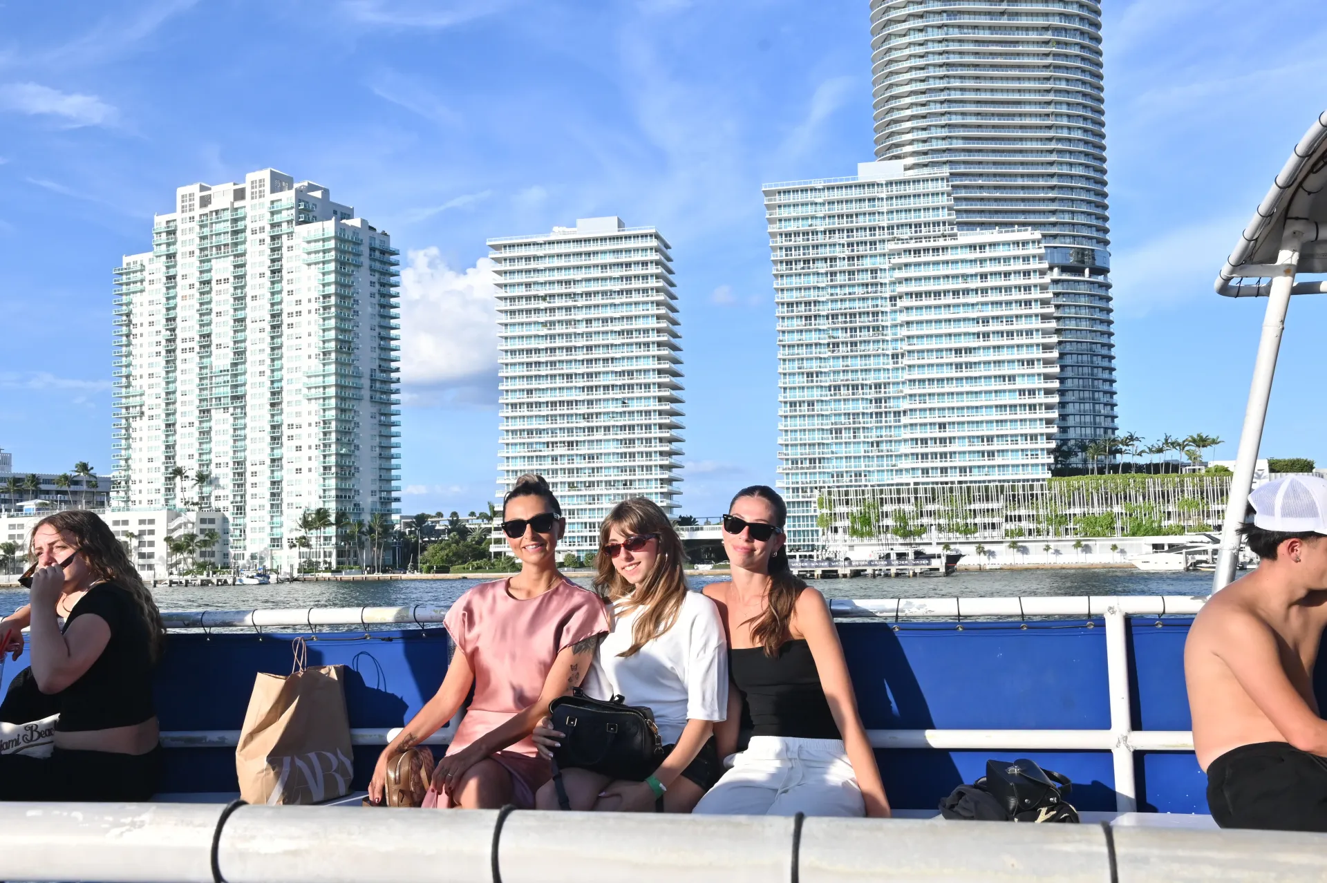 Guests enjoying an affordable Miami sightseeing cruise with views of South Beach.