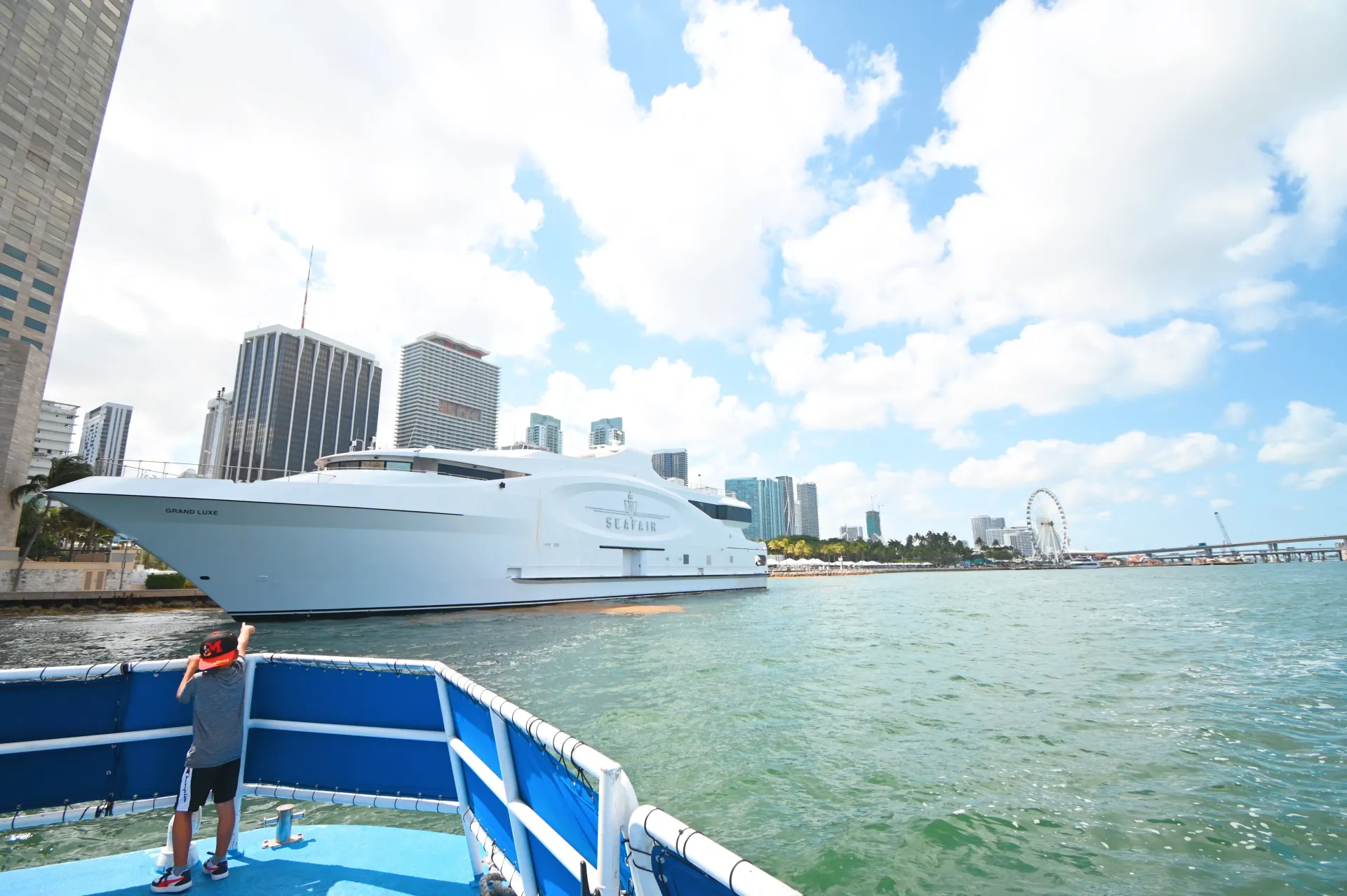 View of Biscayne Bay, the Miami skyline, and luxury waterfront yachts during a Miami Boat Tour in Downtown Miami