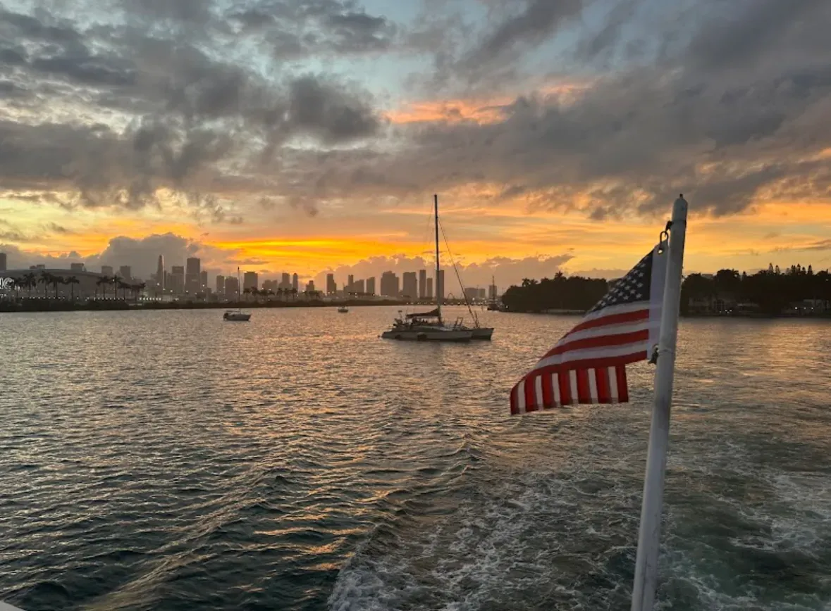 Biscayne Bay sunset cruise with the Miami skyline in the distance.
