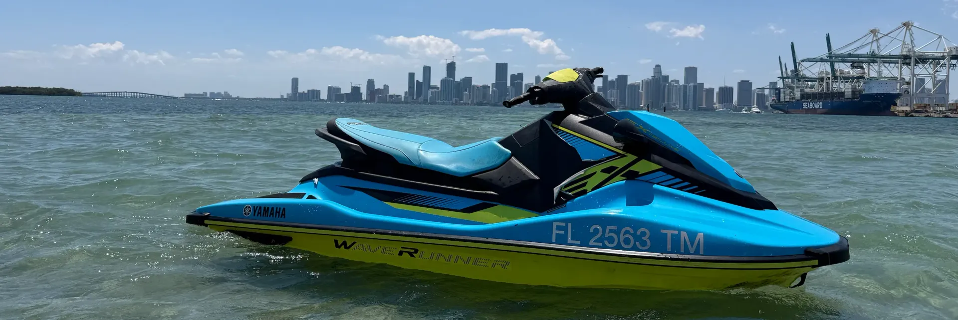 Guided WaveRunner adventure near Bayside Miami featuring waterfront skyline views and open-water riding