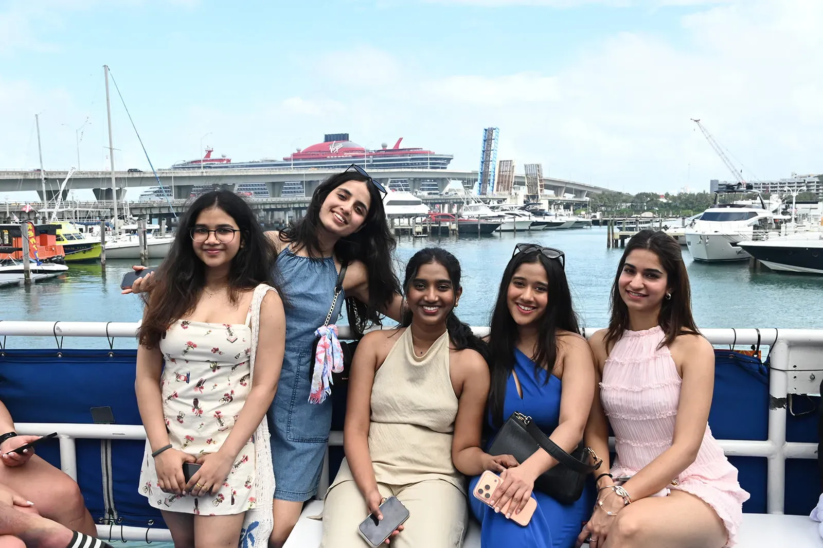 friends enjoying a boat tour in Miami near Port of Miami during a Biscayne Bay sightseeing cruise