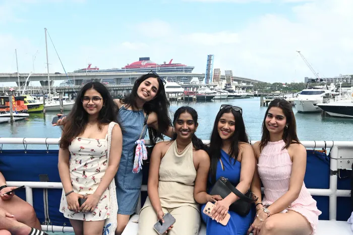friends enjoying a boat tour in Miami near Port of Miami during a Biscayne Bay sightseeing cruise