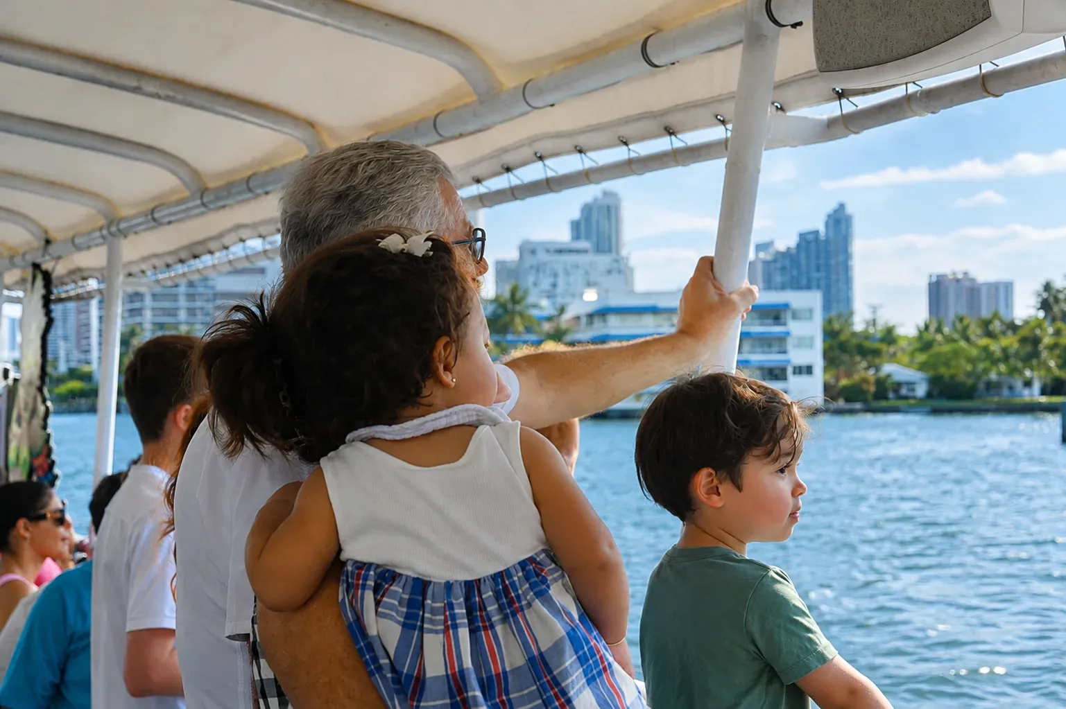 Kid-friendly morning cruises in Miami with families and children sightseeing on Biscayne Bay.