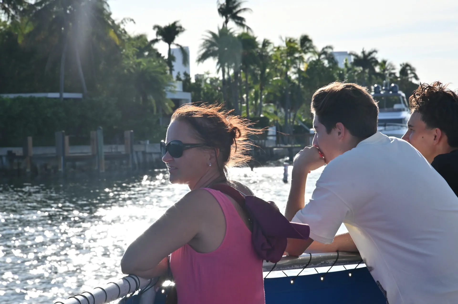Guests enjoying a Miami Early Bird discounted cruise with views of Star Island Miami.