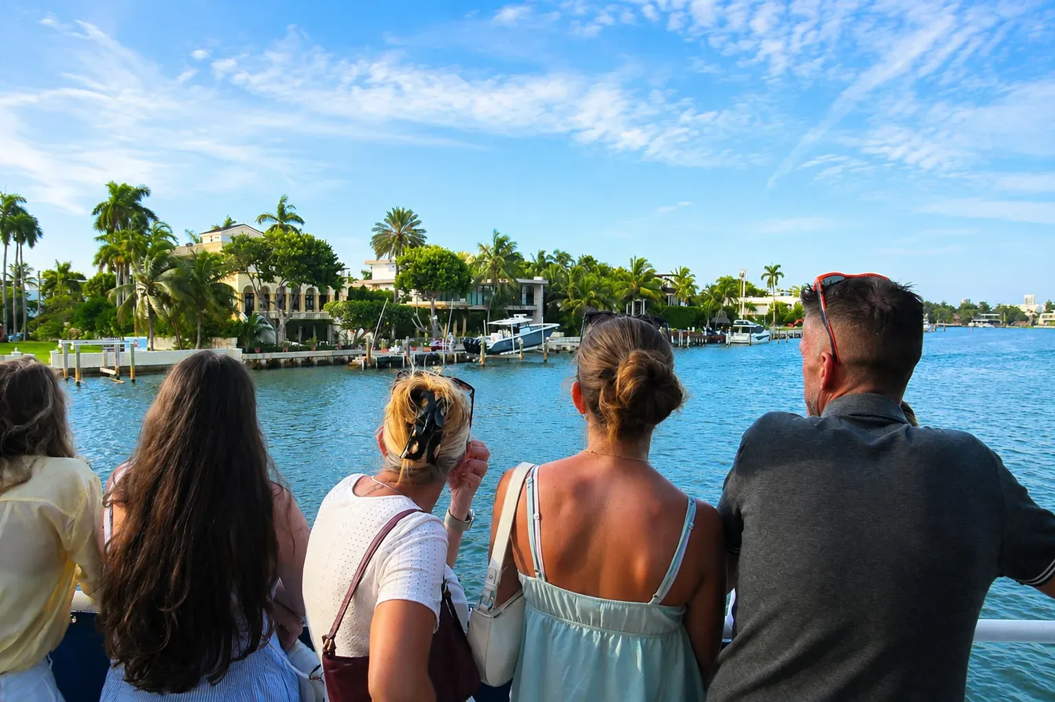 Passengers enjoying the Miami Early Bird Special Cruise at 11:30 a.m. with waterfront views on Biscayne Bay.