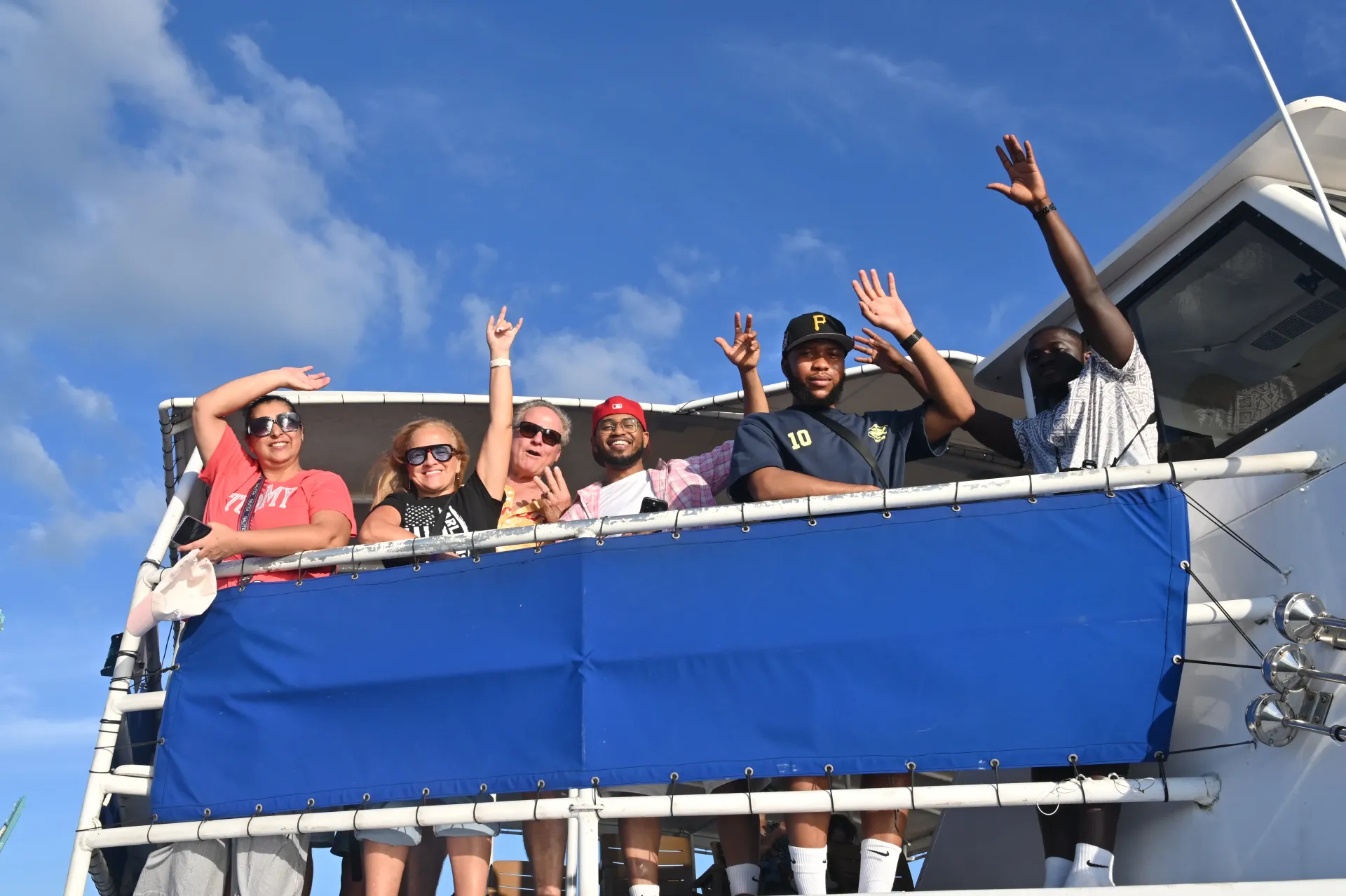Guests enjoying the Miami guided sightseeing route during a live narrated boat cruise on Biscayne Bay.